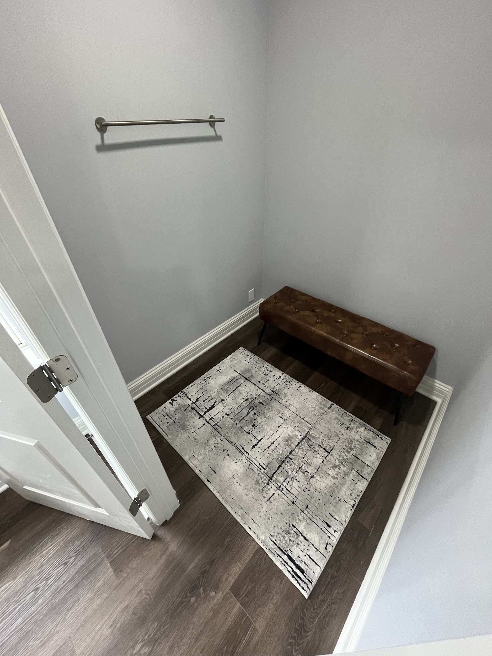 A finished custom rug sized to fit a home hallway.